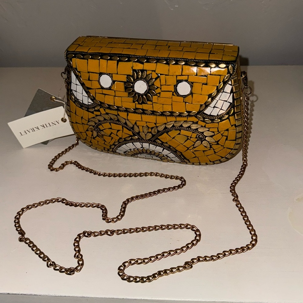 Antik Kraft metal clutch